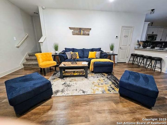 living room with hardwood / wood-style flooring