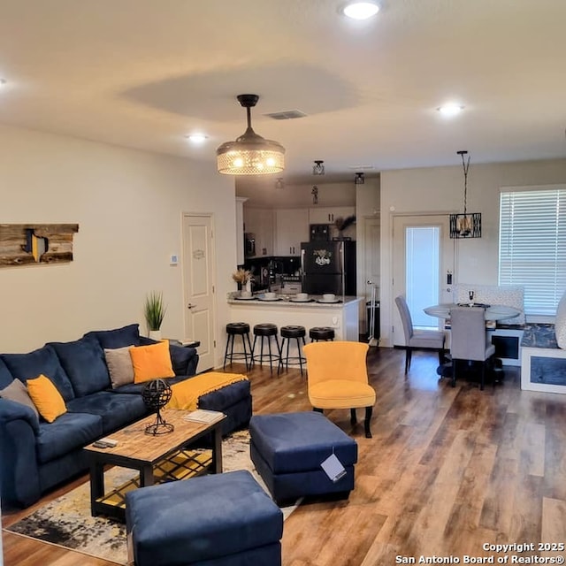 living room with hardwood / wood-style floors