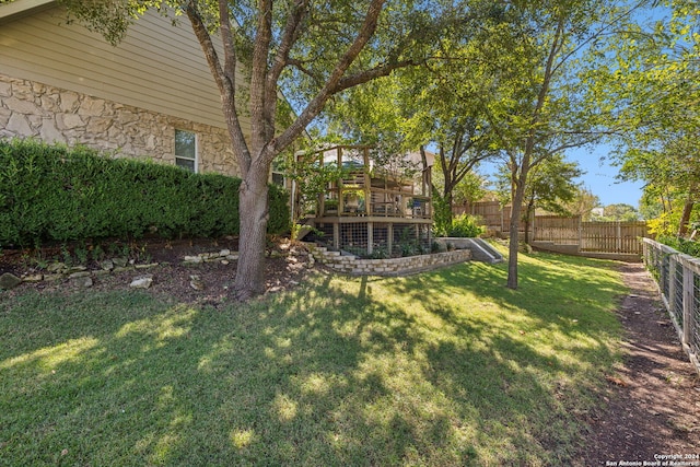 view of yard featuring a deck