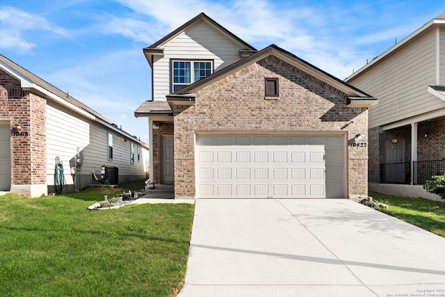 view of property featuring central AC, a garage, and a front lawn