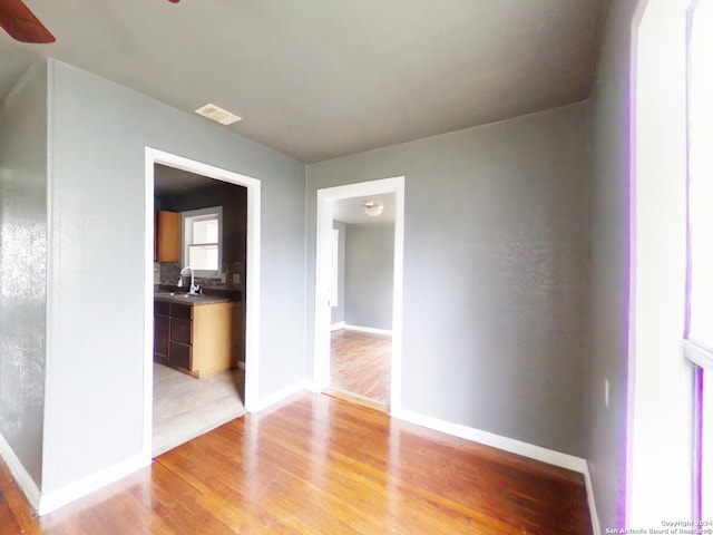 spare room featuring light hardwood / wood-style flooring