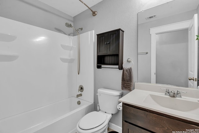 full bathroom featuring vanity, toilet, and shower / washtub combination