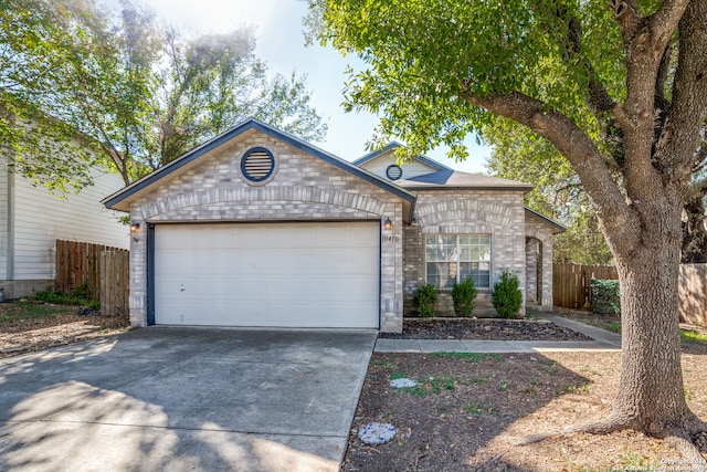 ranch-style home with a garage