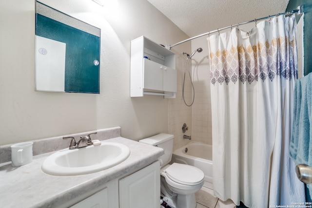 full bathroom with tile patterned floors, vanity, a textured ceiling, shower / bath combo with shower curtain, and toilet