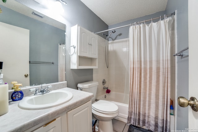 full bathroom with shower / bathtub combination with curtain, tile patterned flooring, a textured ceiling, toilet, and vanity