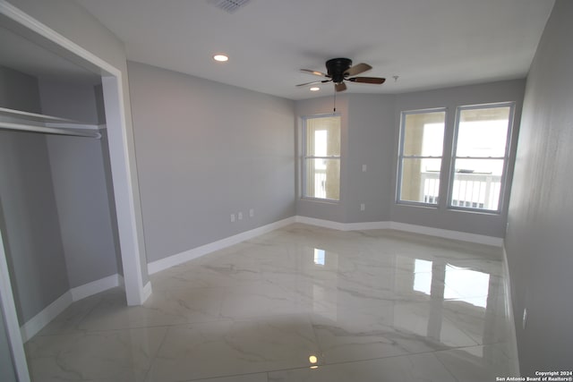 unfurnished bedroom with ceiling fan