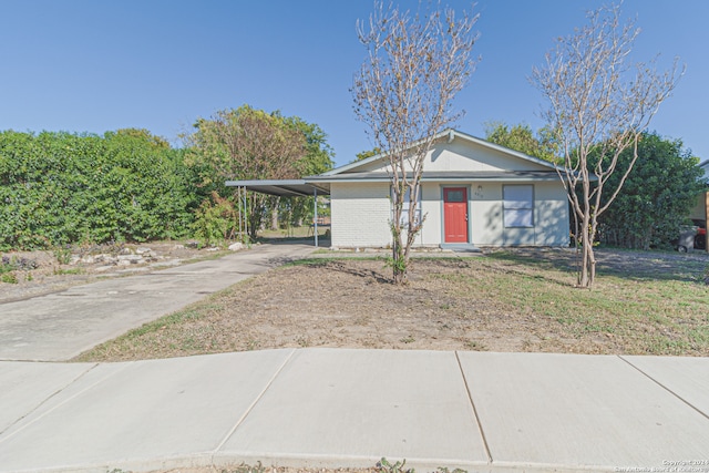 view of front facade with a carport