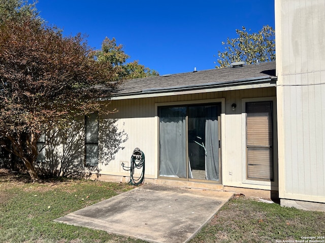 property entrance with a patio