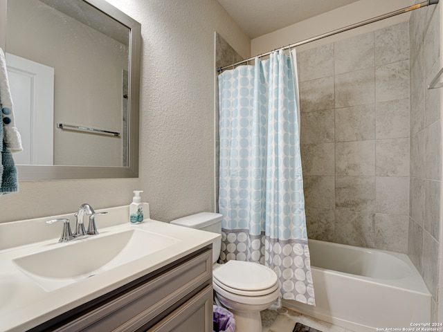 full bathroom featuring toilet, vanity, and shower / tub combo with curtain