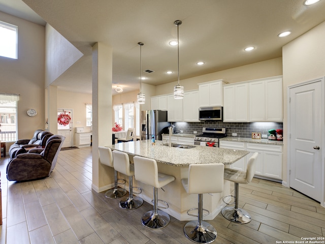 kitchen featuring sink, a healthy amount of sunlight, and appliances with stainless steel finishes