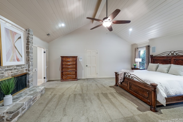 carpeted bedroom with ceiling fan, wooden ceiling, a fireplace, and high vaulted ceiling