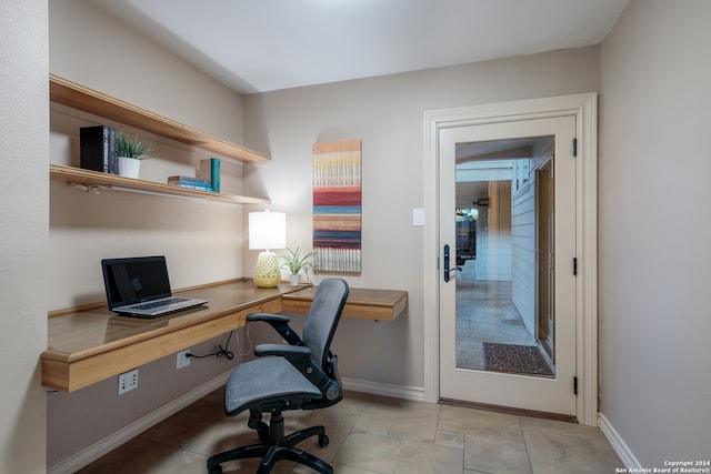 office space featuring light tile patterned floors