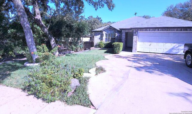 15822 Lomita Springs Dr, San Antonio, TX 78247 - ranch-style home featuring driveway, an attached garage, and stone siding