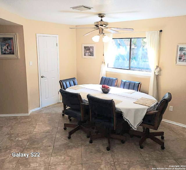 dining space featuring ceiling fan