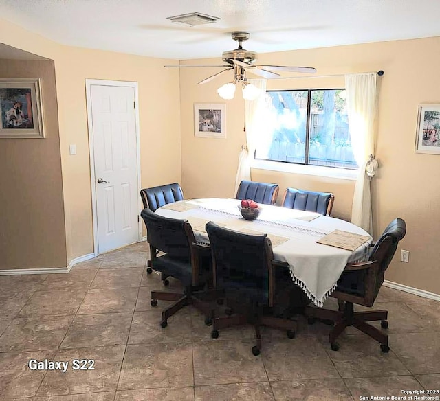 15822 Lomita Springs Dr, San Antonio, TX 78247 - dining space with ceiling fan, tile patterned floors, and baseboards