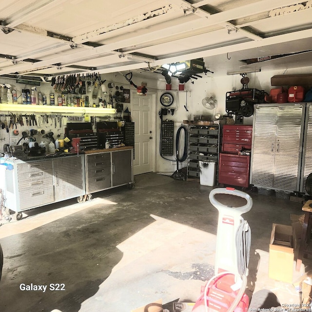 garage with a workshop area