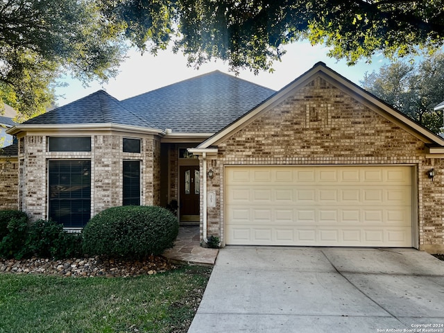 view of front of property with a garage