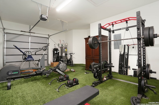 exercise area featuring electric water heater