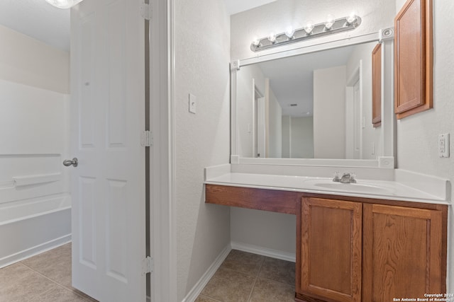 bathroom with vanity and tile patterned floors