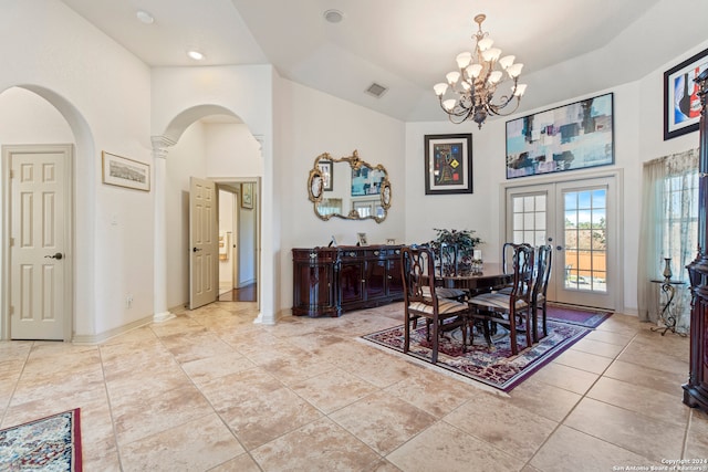 dining area featuring french doors, ornate columns, light tile patterned floors, high vaulted ceiling, and a chandelier