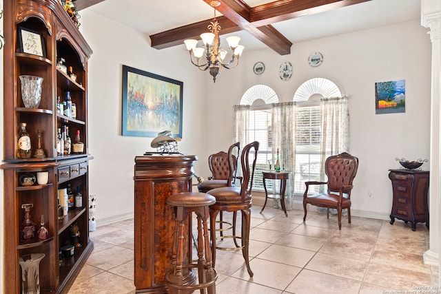 interior space featuring beam ceiling, decorative columns, light tile patterned floors, and an inviting chandelier