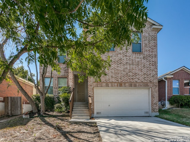 view of front of property featuring a garage