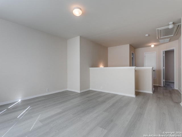 empty room featuring light hardwood / wood-style floors