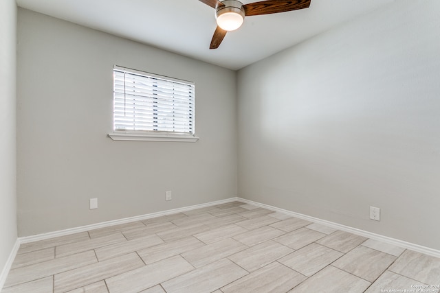 unfurnished room with ceiling fan