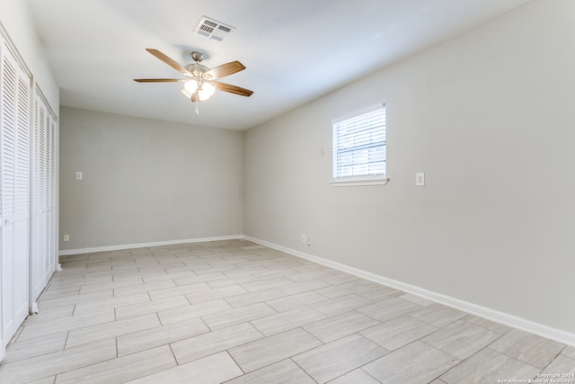 empty room with ceiling fan