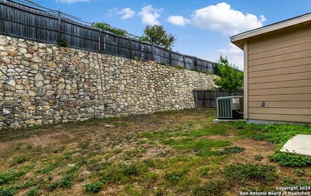 view of yard featuring cooling unit