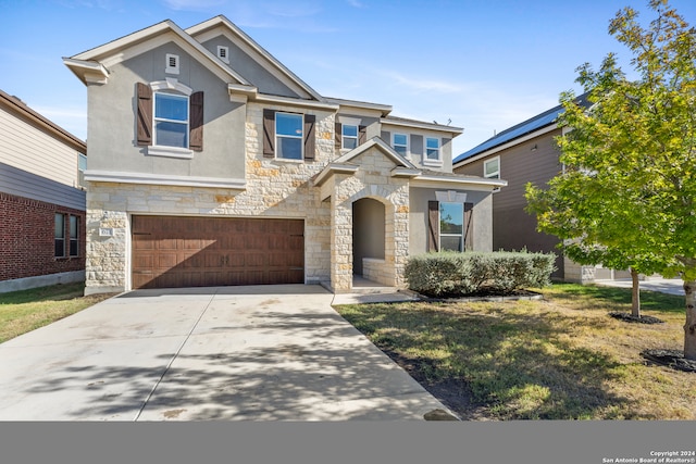 view of front of house with a garage