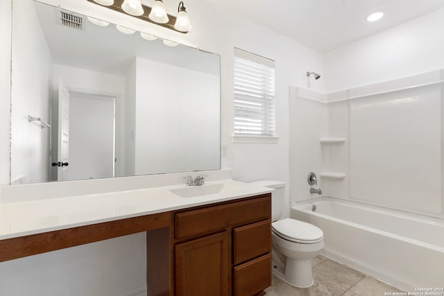 full bathroom featuring tile patterned floors, vanity, toilet, and bathing tub / shower combination