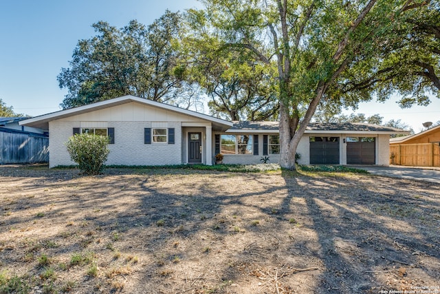 ranch-style home with a garage