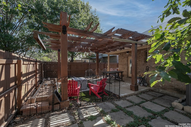 view of patio featuring a pergola