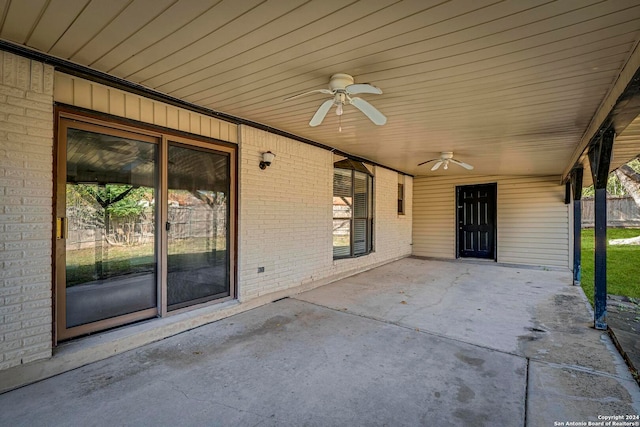 view of patio featuring ceiling fan