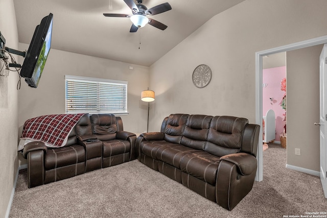 living room with carpet flooring, ceiling fan, and vaulted ceiling