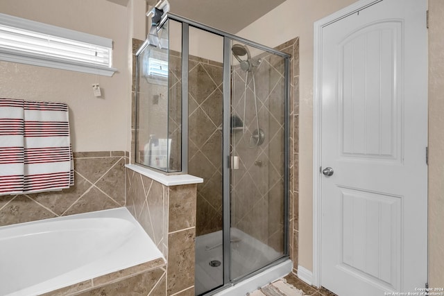 bathroom with plus walk in shower and radiator heating unit