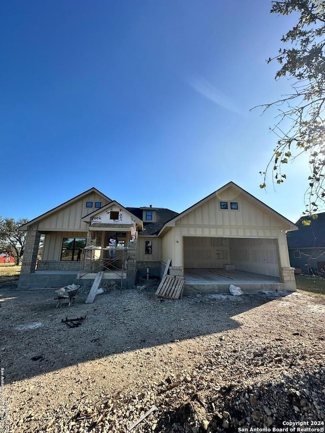 property in mid-construction featuring a garage