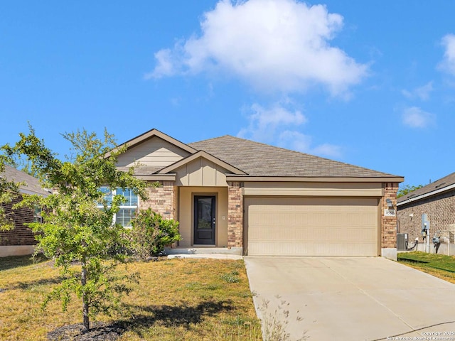 8559 Laxey Wheel, San Antonio, TX 78254 - ranch-style house with a garage, brick siding, concrete driveway, and central AC