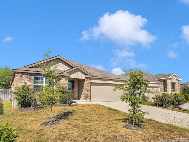 8559 Laxey Wheel, San Antonio, TX 78254 - ranch-style house featuring a garage, driveway, and stone siding