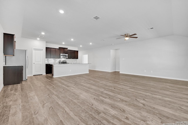 8559 Laxey Wheel, San Antonio, TX 78254 - unfurnished living room featuring ceiling fan, light wood-style flooring, recessed lighting, and baseboards
