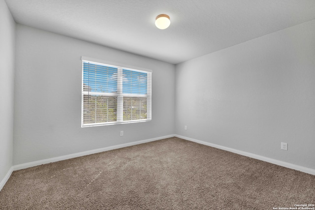 empty room with carpet floors