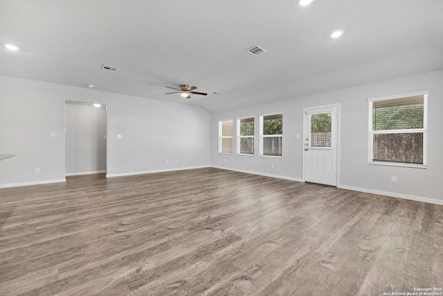 8559 Laxey Wheel, San Antonio, TX 78254 - unfurnished living room featuring ceiling fan, wood finished floors, baseboards, and recessed lighting