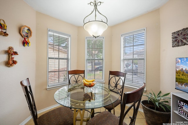 dining room with tile patterned floors