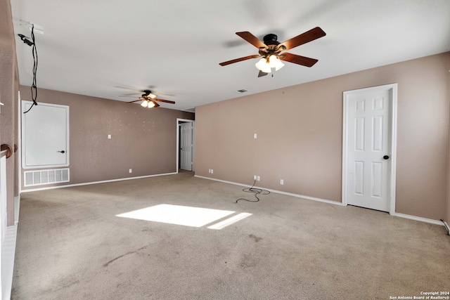 carpeted empty room with ceiling fan