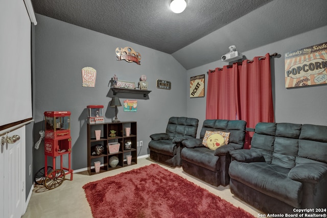 home theater featuring a textured ceiling, carpet floors, and vaulted ceiling