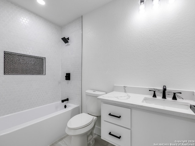 full bathroom featuring shower / bathing tub combination, vanity, and toilet