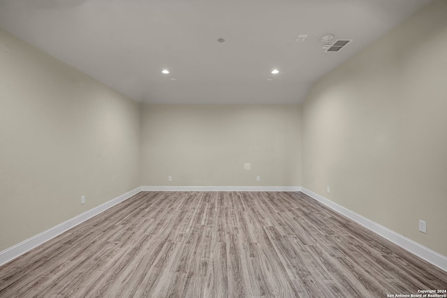 spare room with light wood-type flooring