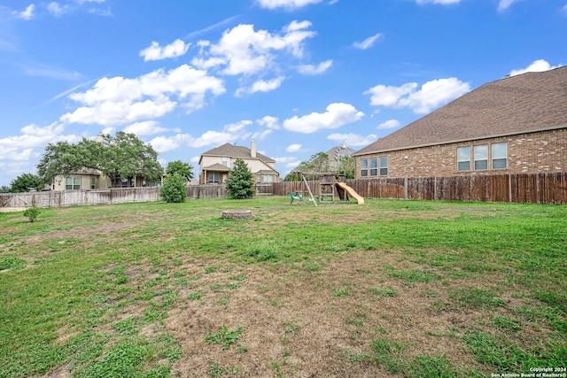 view of yard with a playground