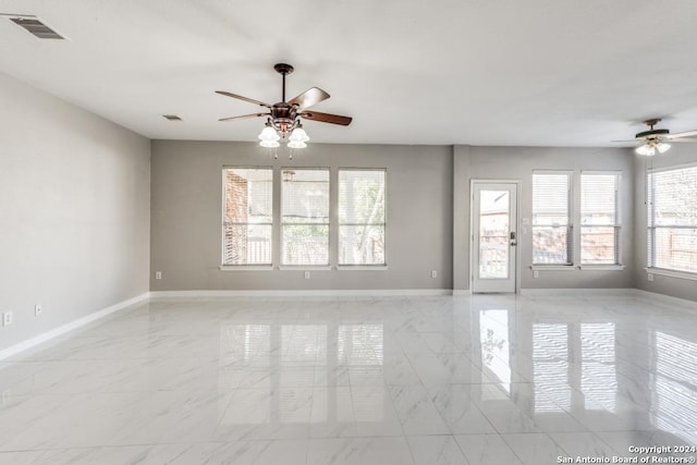 unfurnished room with ceiling fan